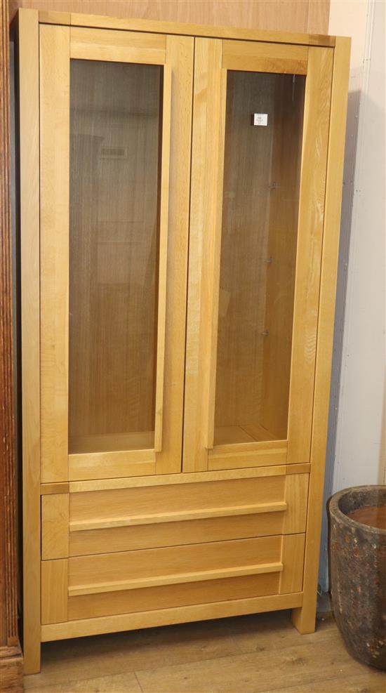 A contemporary oak display cabinet W.95cm